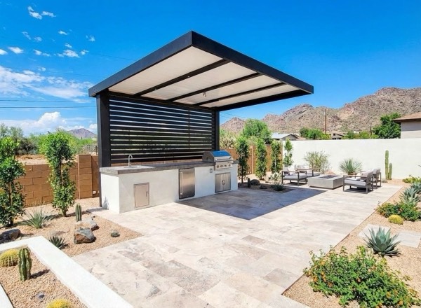 Patio cover and outdoor living installation in Arizona by Green Forever Arizona