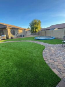 in ground trampoline with artificial grass