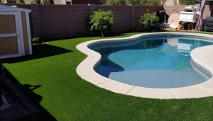 Artificial turf and paver for pool area in Phoenix residential property