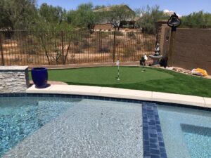 artificial grass putting greens around pool area