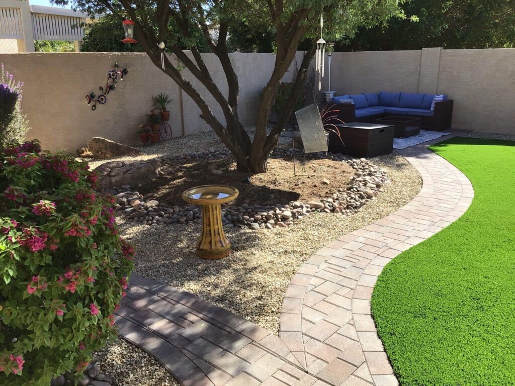 upgrade your backyard with artificial turf and pavers