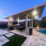low-maintenance backyard artificial grass and patio covers